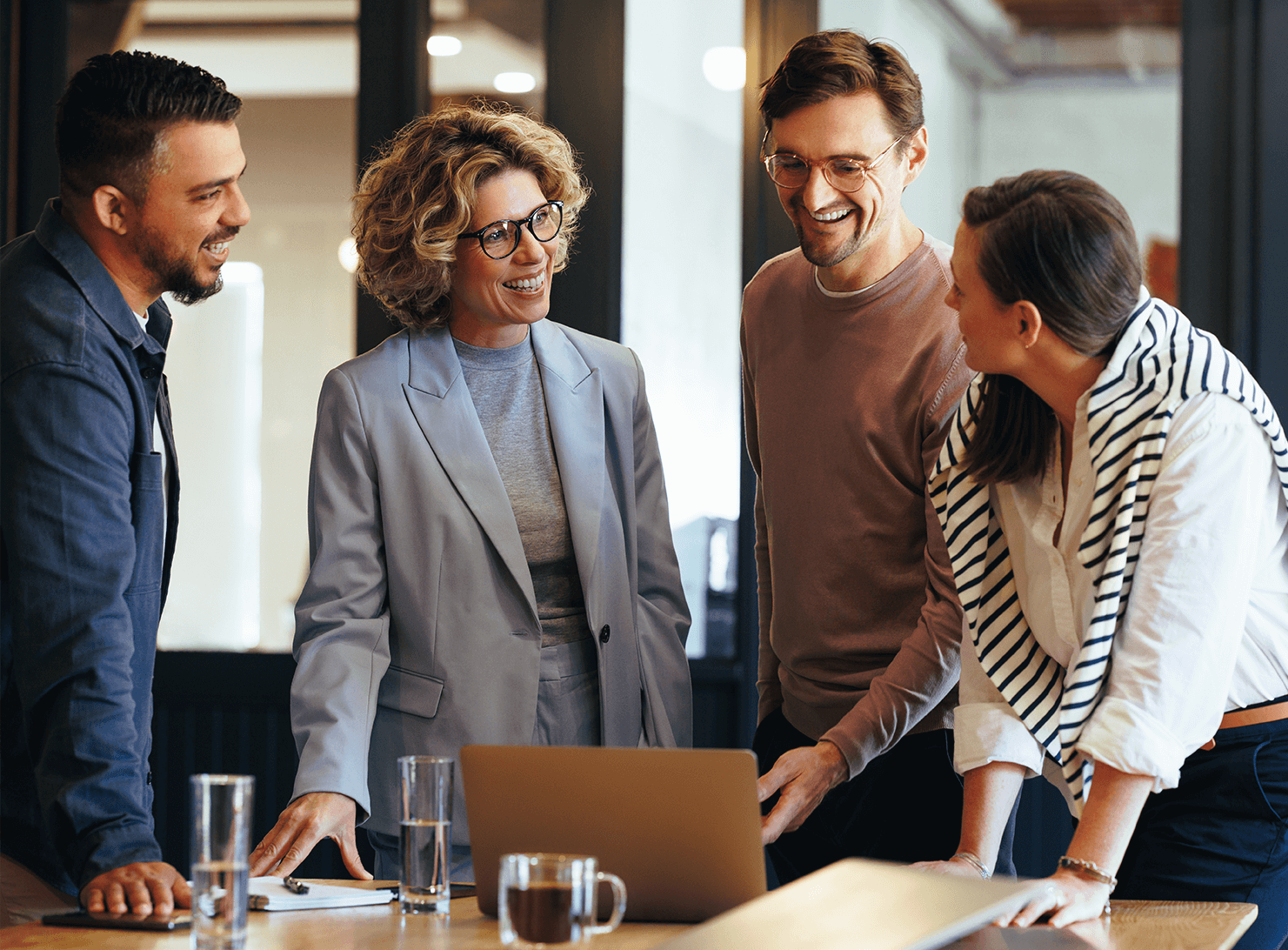 diverse group of business people, woman and men, talking stock image